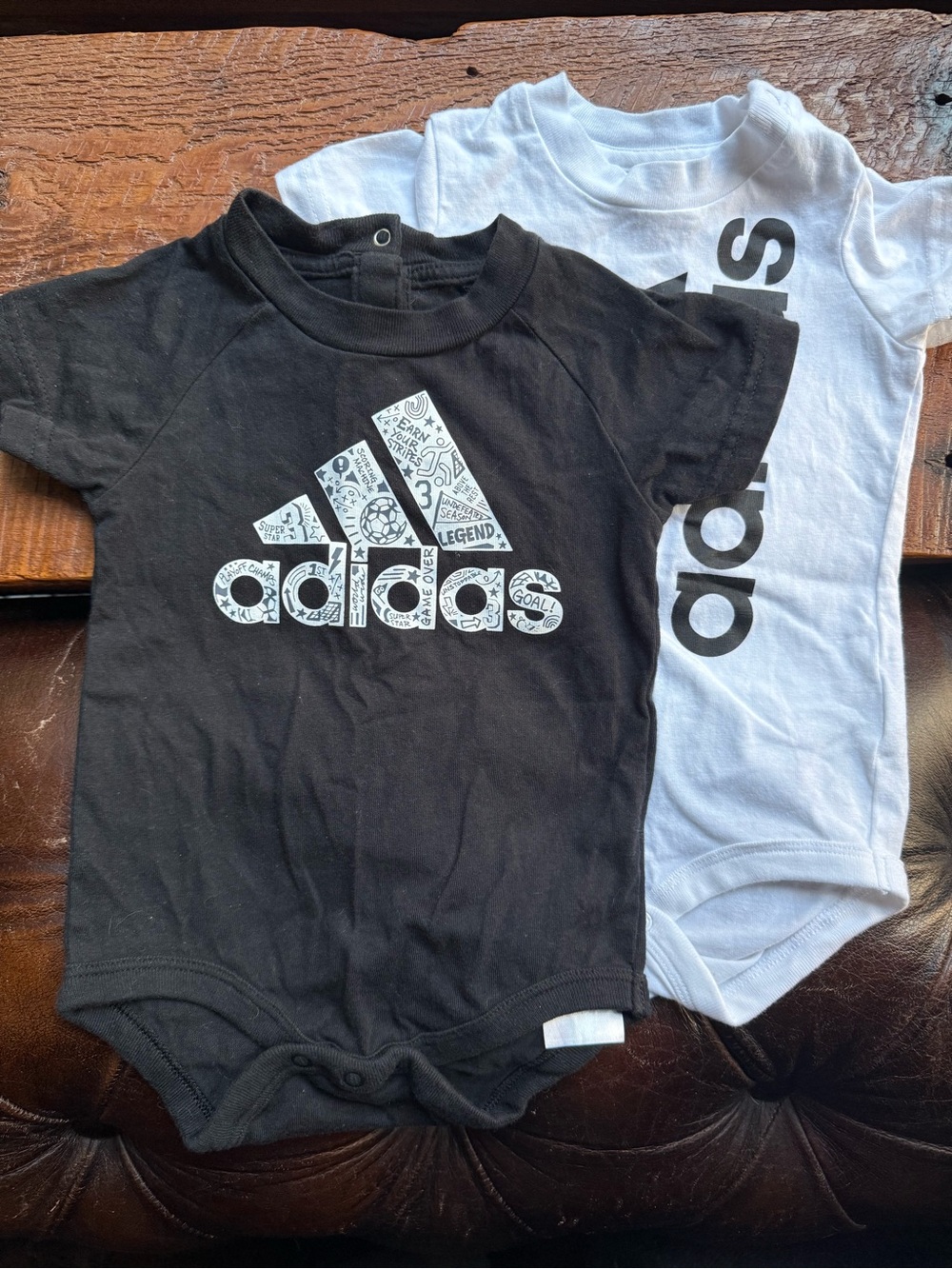 2 adidas logo Baby Bodysuits